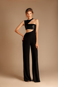 black crepe and leather jumpsuit with cut outs 