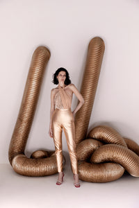 nude cross jumpsuit, fitted pant and draped upper part 