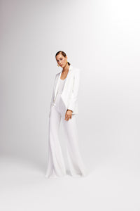 white tailored suit jacket with sequin detail on the shoulder 